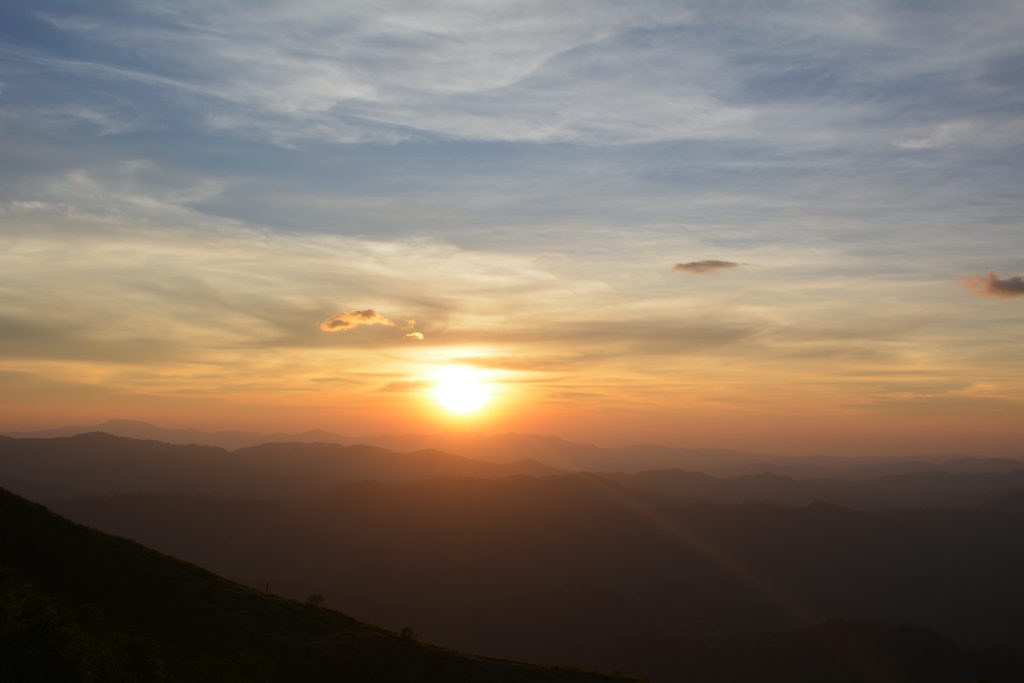 Beautiful sunset in mountains. Summer sundown. Wonderful nature background.